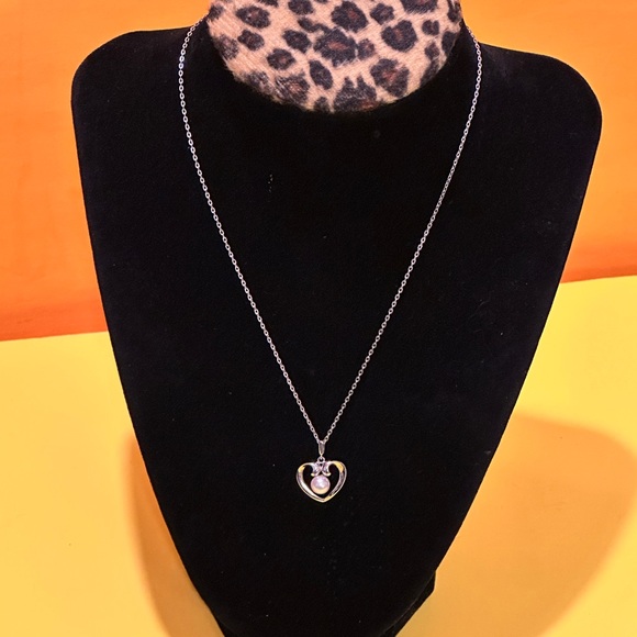 Mikimoto Silver Heart Necklace with Pearl
925 silver made. - Picture 3 of 12